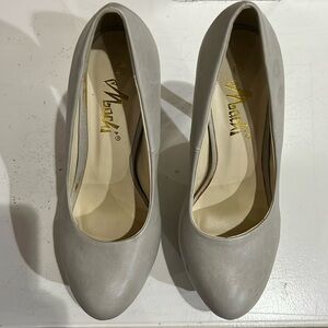 Tan platform heel pumps. Worn once. 5” heel and 1 1/2” platform.